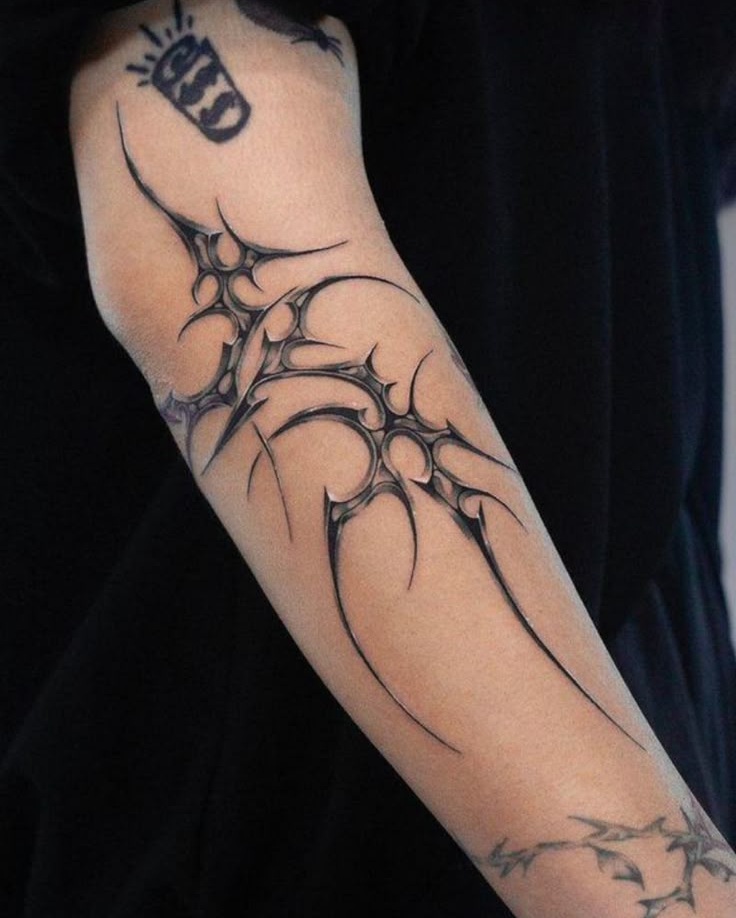 25 Ideas Tribal Tattoo Designs: Bold, Geometric, and Abstract Ink Styles