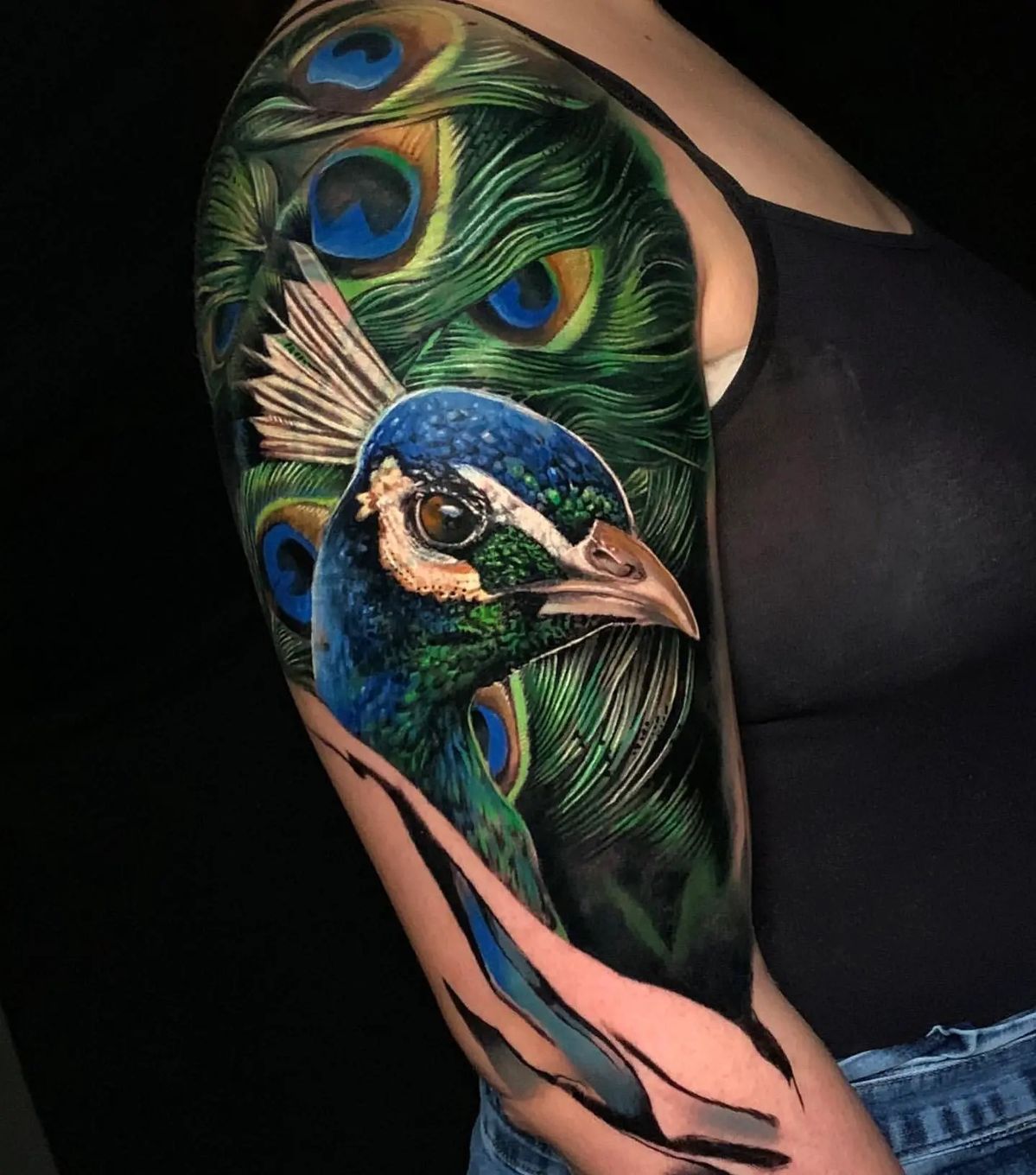The Symbolic Splendor of Peacock Tattoos: Powerful Designs That Speak for Themselves