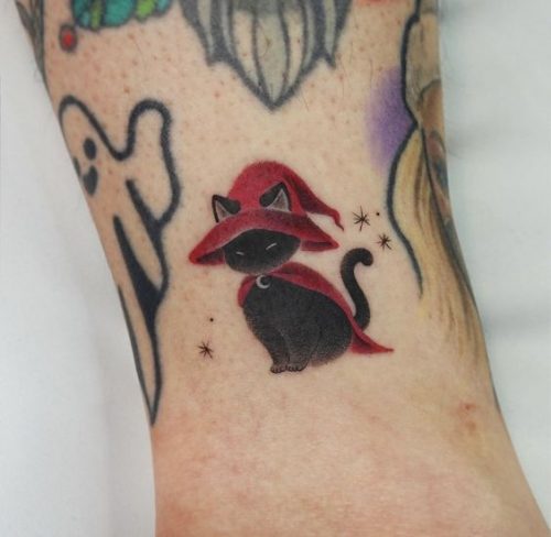 Unveiling 25 Cute Halloween Tattoo Designs: Ghosts, Ghouls, and Whimsical Wonders Get Inked!