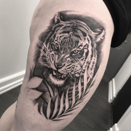 25 Tiger Tattoo on Thigh Ideas