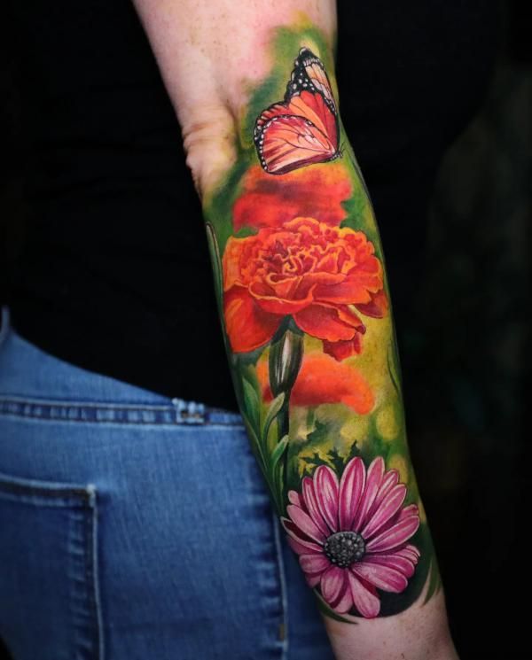 26 Marigold Tattoo Ideas for Every Style Fineline, Realistic, Black and White, Traditional, and Color Designs