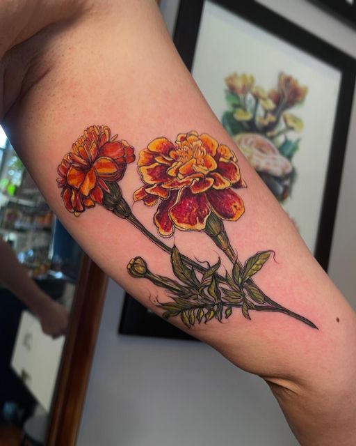 26 Marigold Tattoo Ideas for Every Style Fineline, Realistic, Black and White, Traditional, and Color Designs