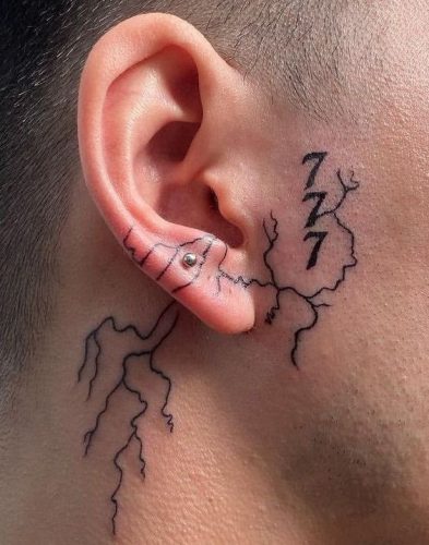 Unleash the Storm: 18 Striking Lightning Bolt Tattoo Designs for Electrifying Expression in