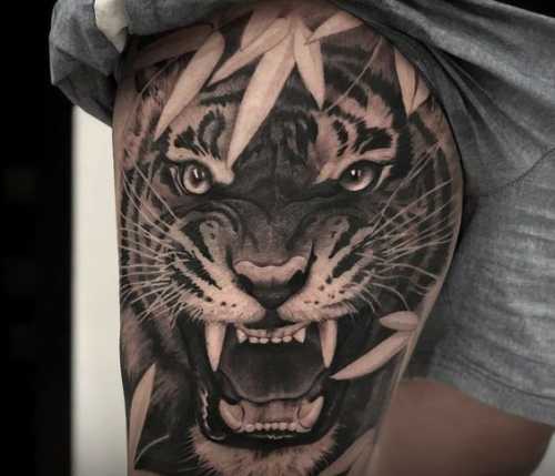 25 Tiger Tattoo on Thigh Ideas