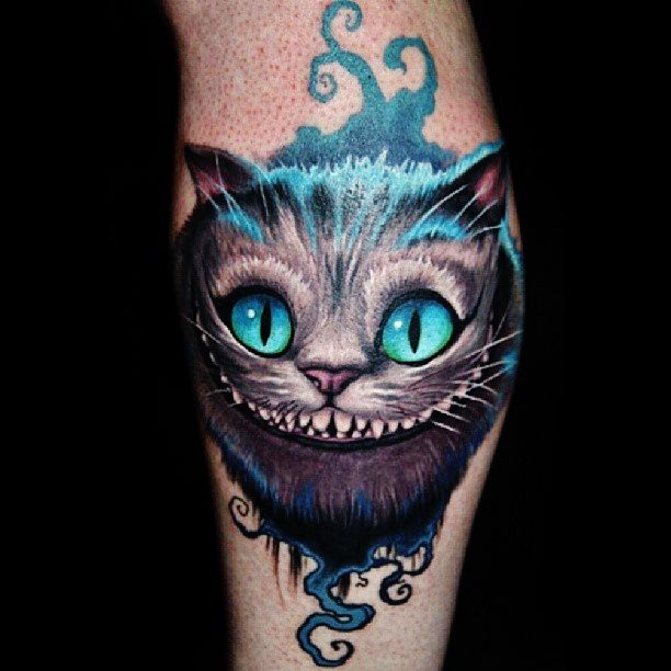29 Cheshire Cat Tattoo Ideas: From Whimsical Grins to Dark Wonderland Symbolism