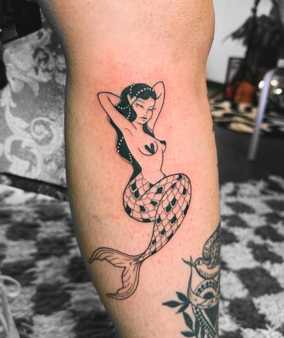27 Mermaid Tattoo Ideas With Minimalist, Traditional, Afro, Siren, and Barbie-Inspired Designs
