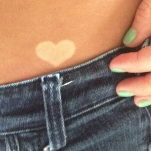 15 Creative Tan Tattoo Ideas for : Embrace the Sun with Stylish Skin Art
