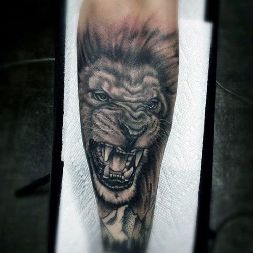 19 Express Strength with a Lion Tattoo on Forearm: Design Inspiration