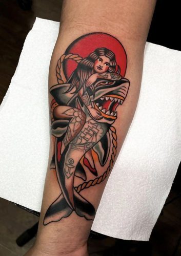 Explore 18 Stunning Shark Tattoo Designs for : From Elegant Minimalism to Vibrant Watercolors