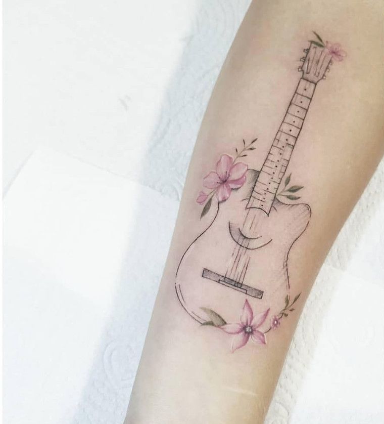 31 Guitar Tattoo Ideas for Music Lovers: From Minimalist Designs to Bold Sleeve Art