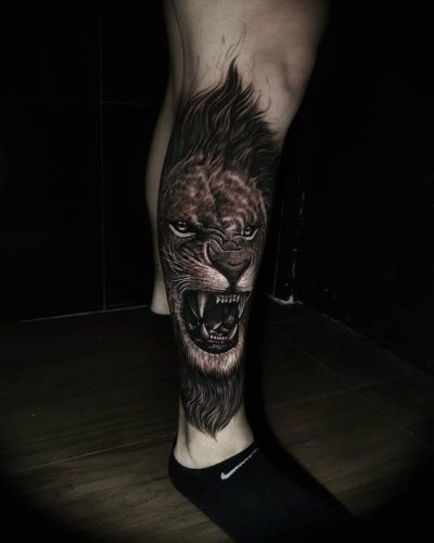 Leg Lion Tattoo: 22 Dynamic Designs for a Daring Look