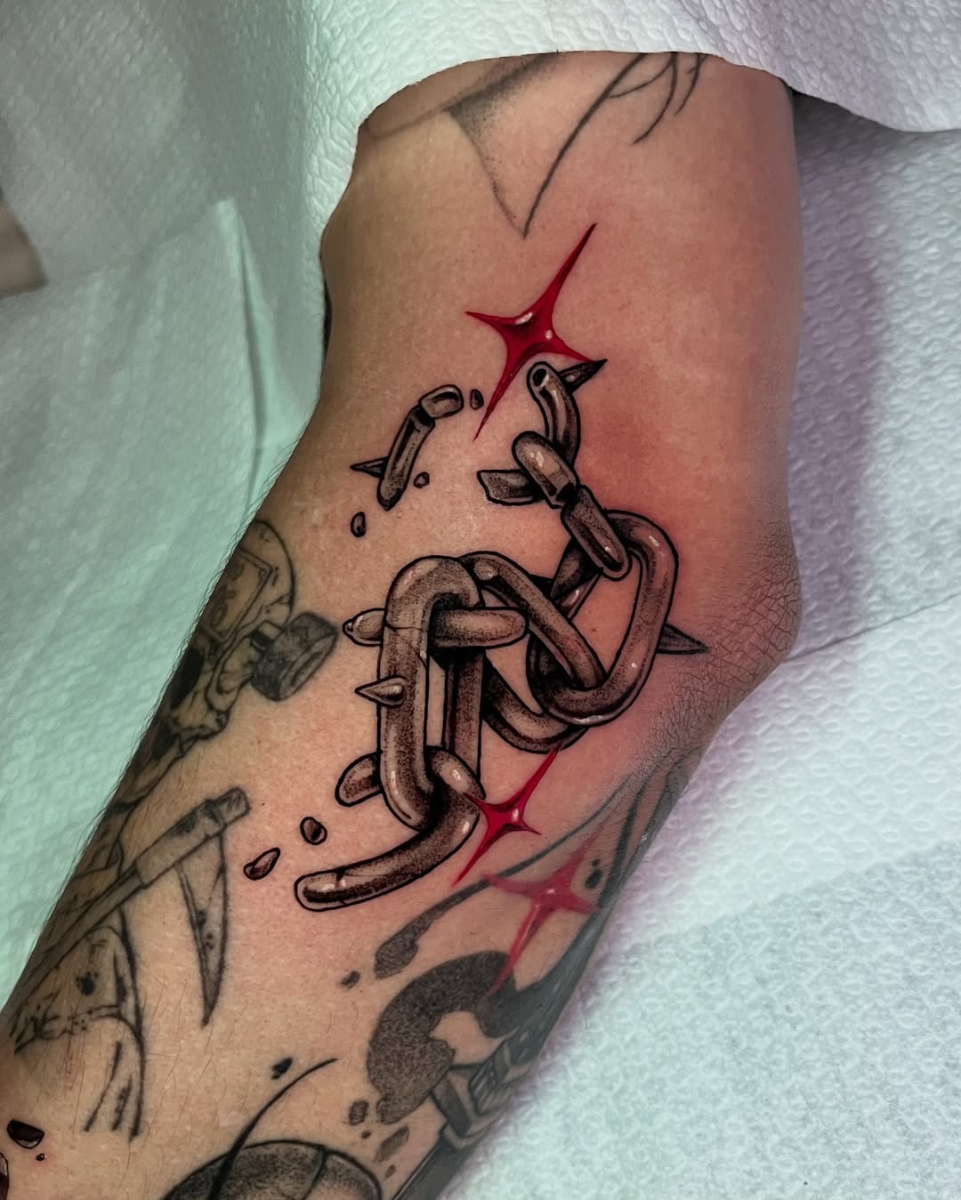 29 Filler Tattoo Ideas: Smart Ways to Close Gaps in Your Sleeve with Flowers, Snakes and Symbols