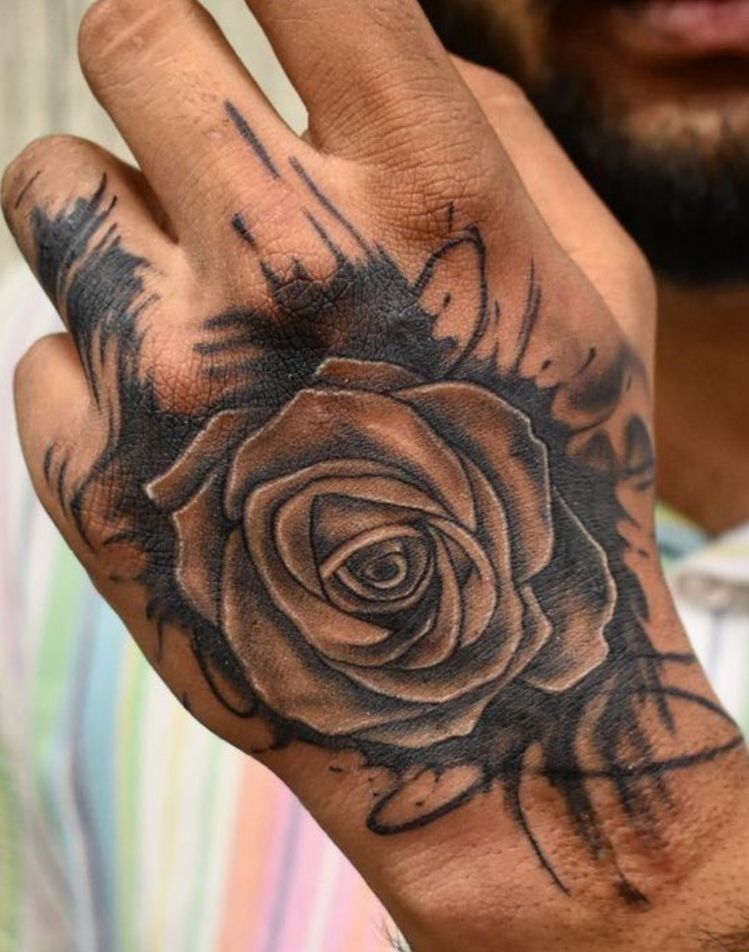 27 Rose Hand Tattoo Ideas: From Classic Black-and-Gray to Bold Narrative Pieces