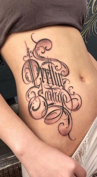 26 Lettering Tattoo Ideas for Men: Bold Fonts, Chicano, Japanese, Vertical, Fine Line & More