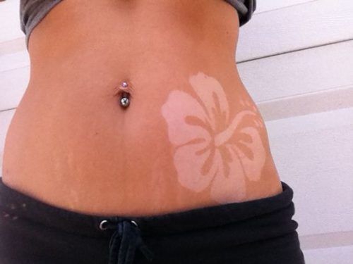 15 Creative Tan Tattoo Ideas for : Embrace the Sun with Stylish Skin Art