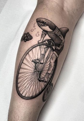 Explore 18 Stunning Shark Tattoo Designs for : From Elegant Minimalism to Vibrant Watercolors