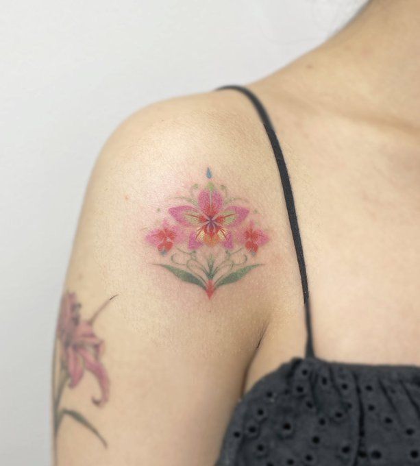 26 Orchid Tattoo Ideas for Minimalist, Colour, and Fine Line Designs