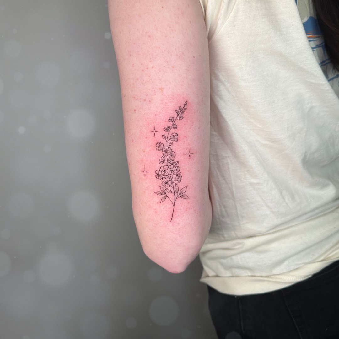 28 Larkspur Tattoo Ideas: Delicate July Blooms with Big Meaning