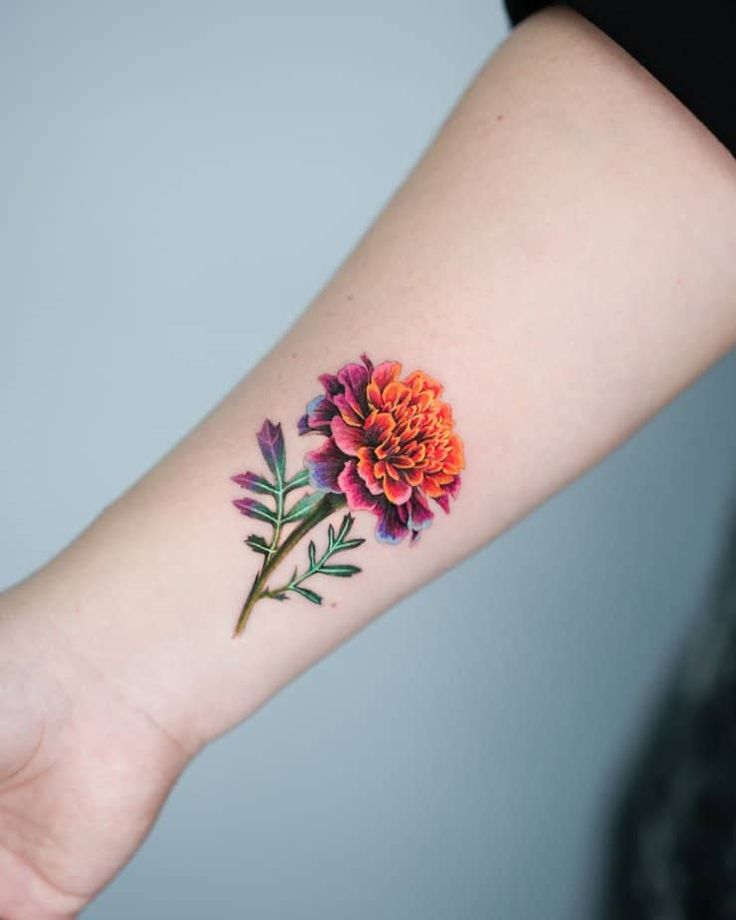 26 Marigold Tattoo Ideas for Every Style Fineline, Realistic, Black and White, Traditional, and Color Designs