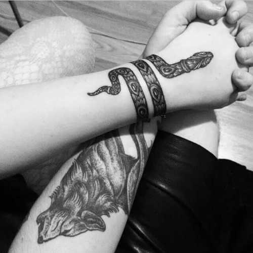 16 Snake Tattoos Wrapped Around Arm Inspiration