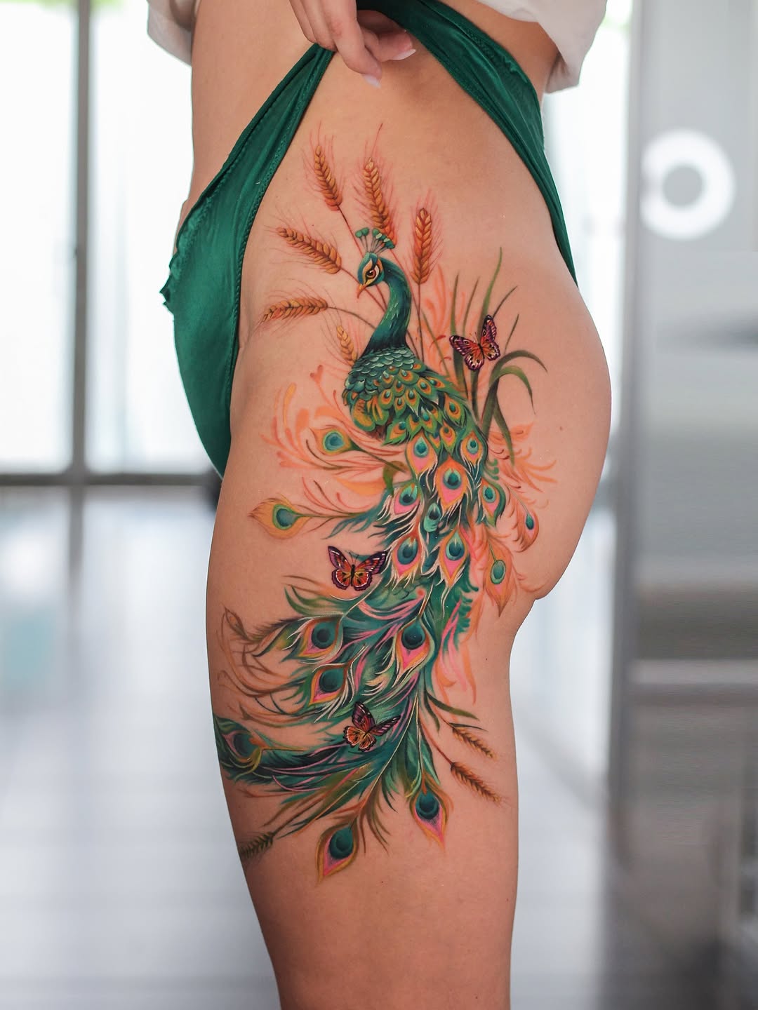 The Symbolic Splendor of Peacock Tattoos: Powerful Designs That Speak for Themselves