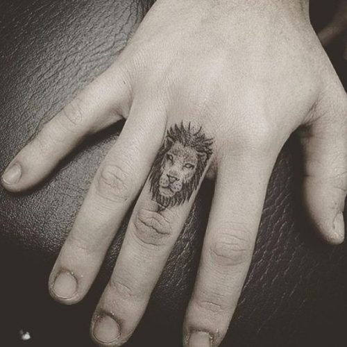 Fierce and Detailed: 19 Lion Tattoo on Finger Ideas
