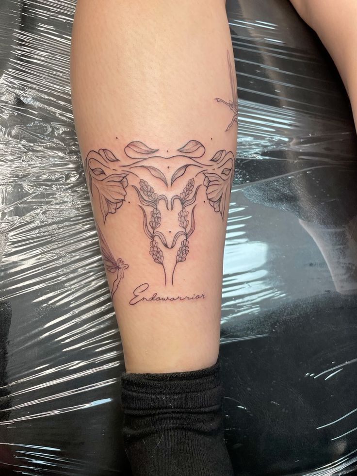 29 Womb Tattoo Ideas for : Floral, Anime, Goth, Succubus, and Symbolic Designs