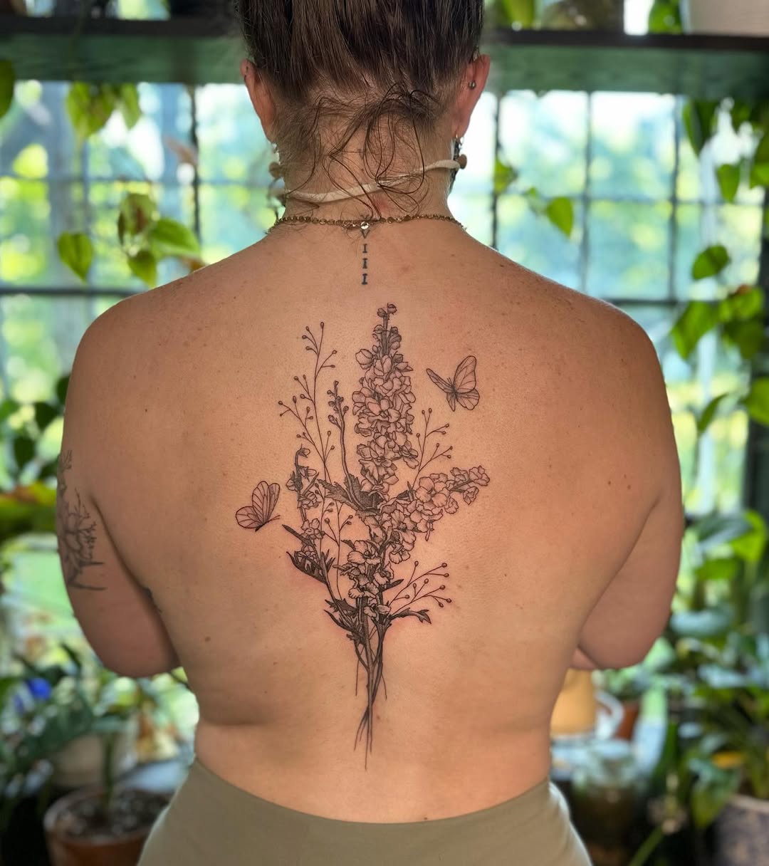 28 Larkspur Tattoo Ideas: Delicate July Blooms with Big Meaning