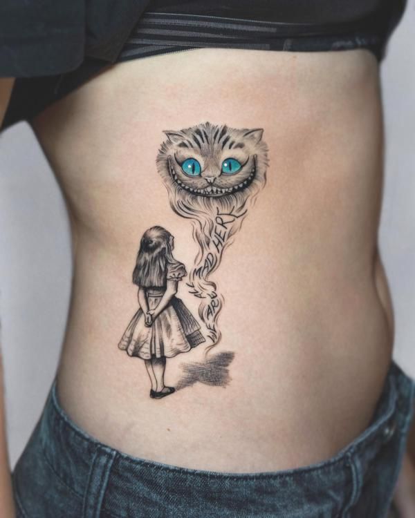 29 Cheshire Cat Tattoo Ideas: From Whimsical Grins to Dark Wonderland Symbolism