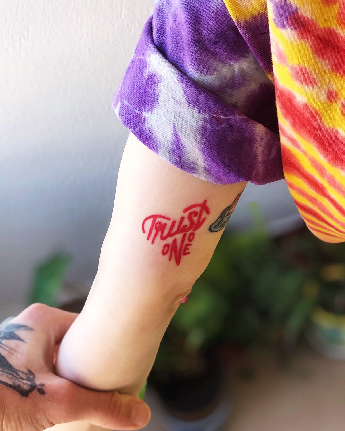 25 Trust No One Tattoo Designs with Lettering, Fonts, Ideas for Men and Women