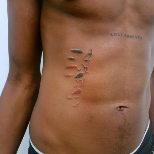 29 Colored Tattoo Ideas for Brown Skin Tones