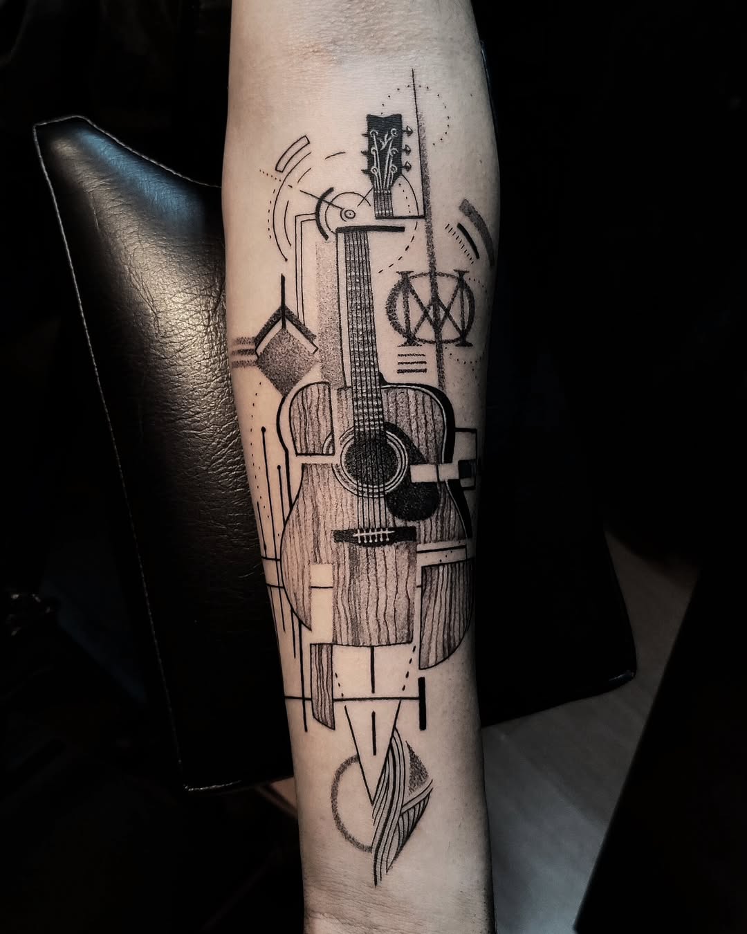 31 Guitar Tattoo Ideas for Music Lovers: From Minimalist Designs to Bold Sleeve Art