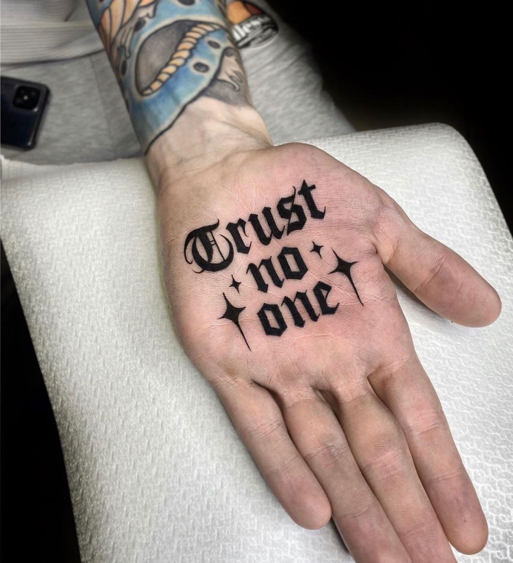 25 Trust No One Tattoo Designs with Lettering, Fonts, Ideas for Men and Women