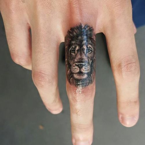 Fierce and Detailed: 19 Lion Tattoo on Finger Ideas