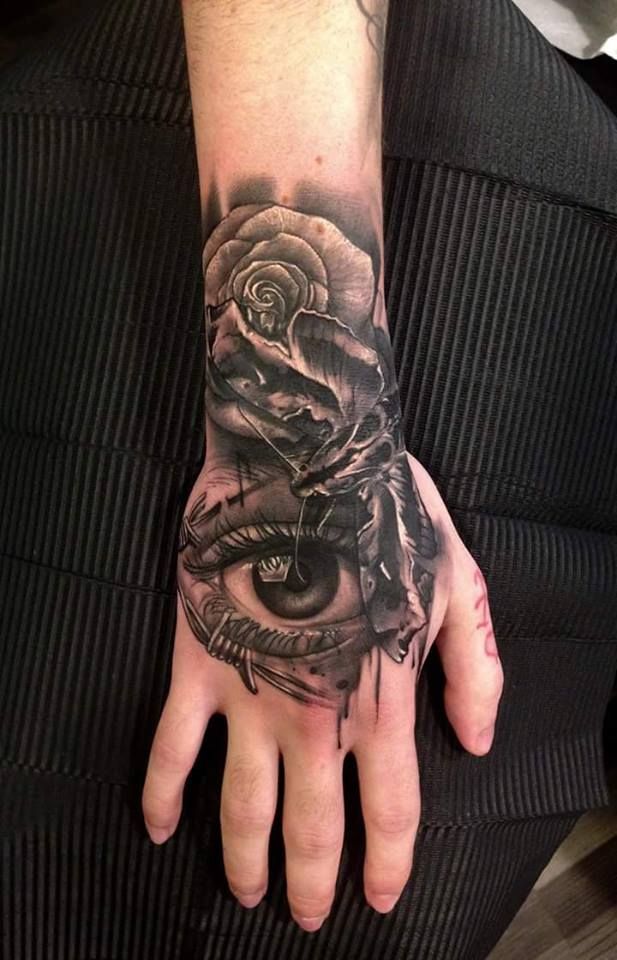 27 Rose Hand Tattoo Ideas: From Classic Black-and-Gray to Bold Narrative Pieces