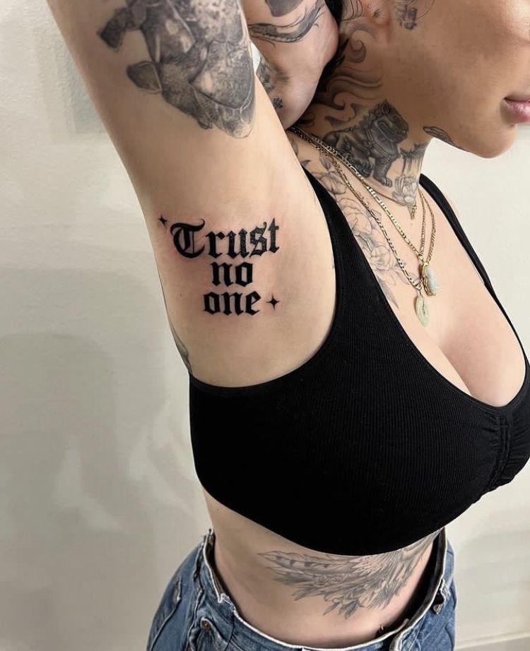 25 Trust No One Tattoo Designs with Lettering, Fonts, Ideas for Men and Women