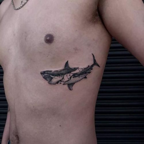 Explore 18 Stunning Shark Tattoo Designs for : From Elegant Minimalism to Vibrant Watercolors