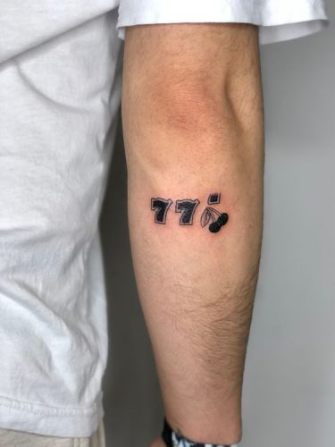 Celestial Sequences: 19 Angel Number Tattoo Ideas for