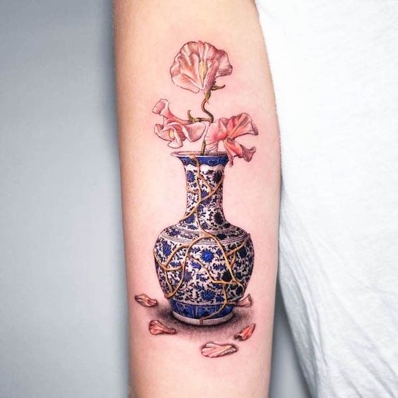 Discover 24 Stunning Flower Bouquet Tattoo Ideas: Delicate, Colorful, and Minimalist Designs