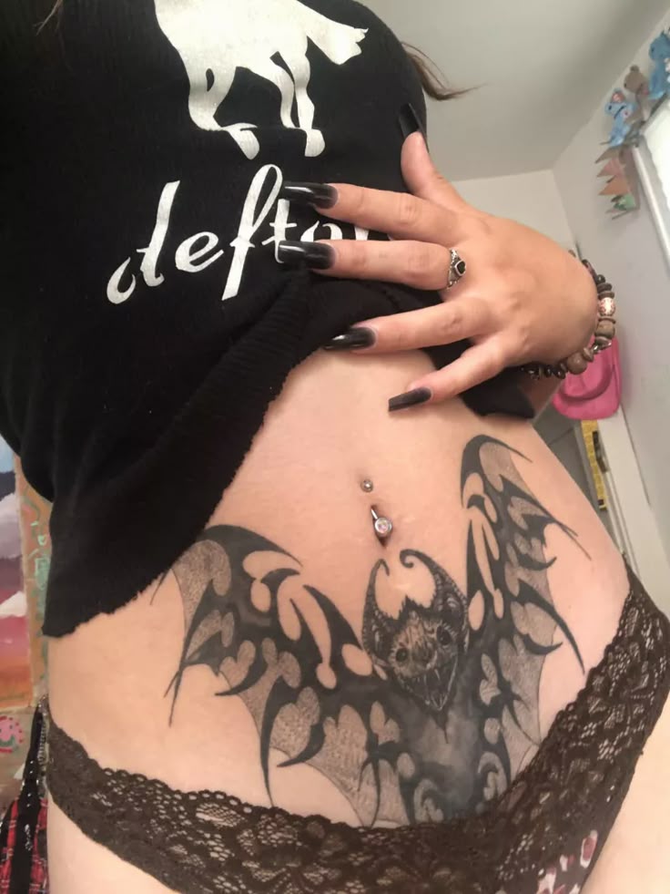 29 Womb Tattoo Ideas for : Floral, Anime, Goth, Succubus, and Symbolic Designs