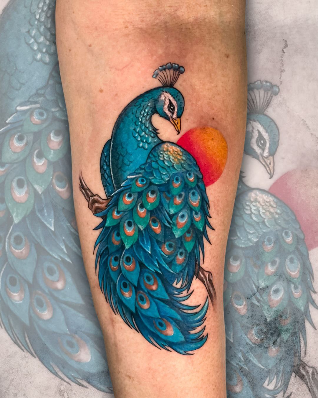 The Symbolic Splendor of Peacock Tattoos: Powerful Designs That Speak for Themselves