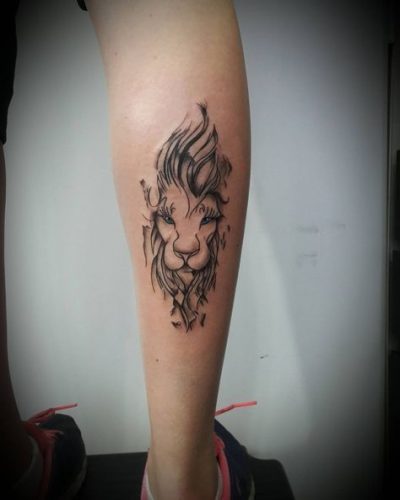 27 Minimalist Lion Tattoo: Subtle Elegance and Symbolism