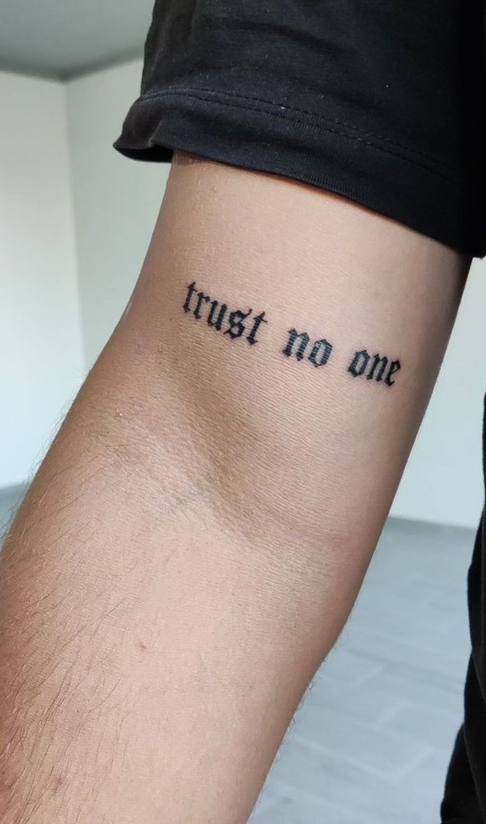 25 Trust No One Tattoo Designs with Lettering, Fonts, Ideas for Men and Women