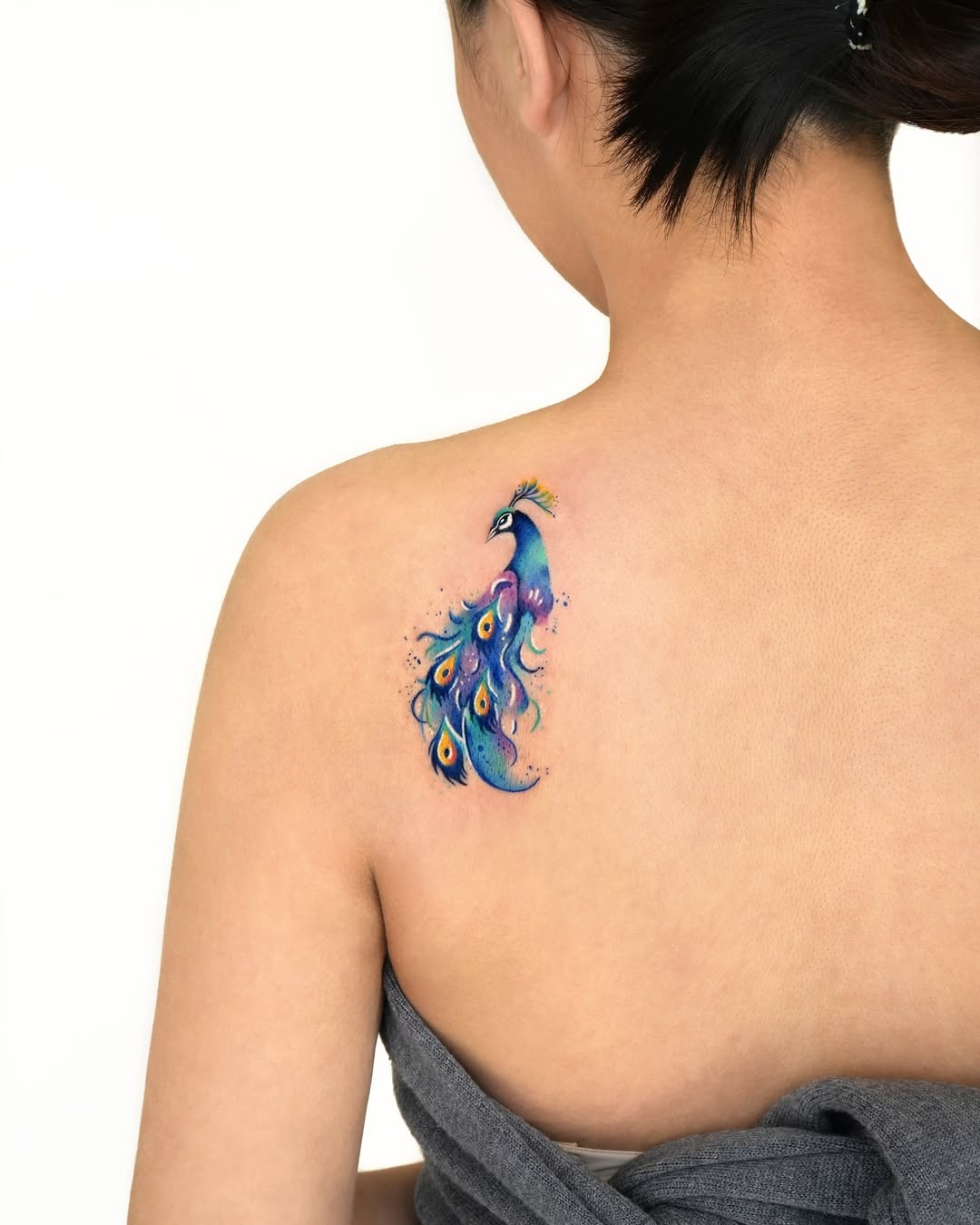 The Symbolic Splendor of Peacock Tattoos: Powerful Designs That Speak for Themselves