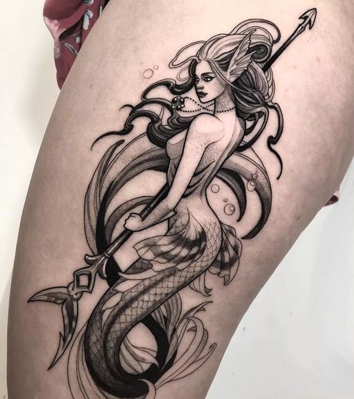 27 Mermaid Tattoo Ideas With Minimalist, Traditional, Afro, Siren, and Barbie-Inspired Designs