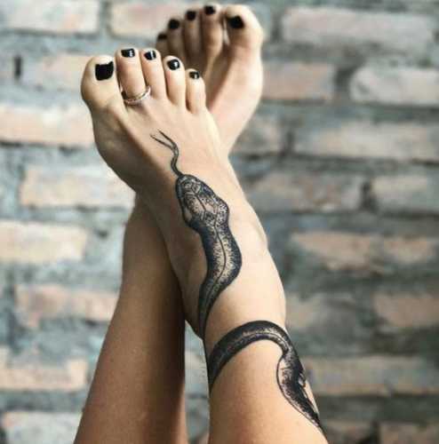 29 Mesmerizing Snake Tattoo Design Ideas