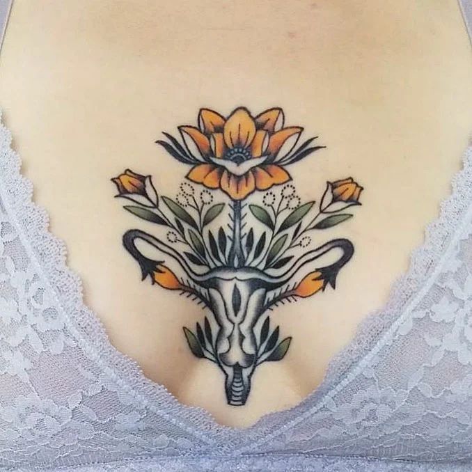 29 Womb Tattoo Ideas for : Floral, Anime, Goth, Succubus, and Symbolic Designs