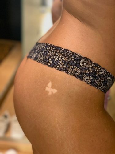 15 Creative Tan Tattoo Ideas for : Embrace the Sun with Stylish Skin Art