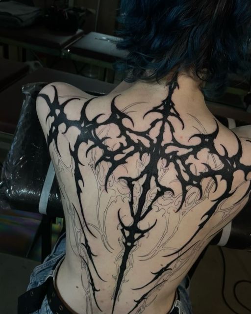 25 Ideas Tribal Tattoo Designs: Bold, Geometric, and Abstract Ink Styles