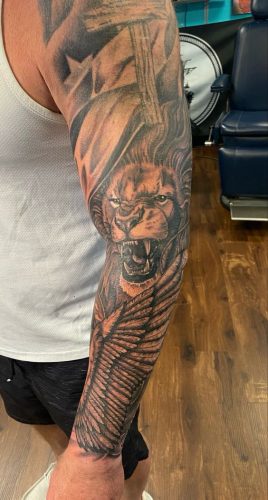24 Lion Tattoo Half Sleeve: Showcase Power and Artistry